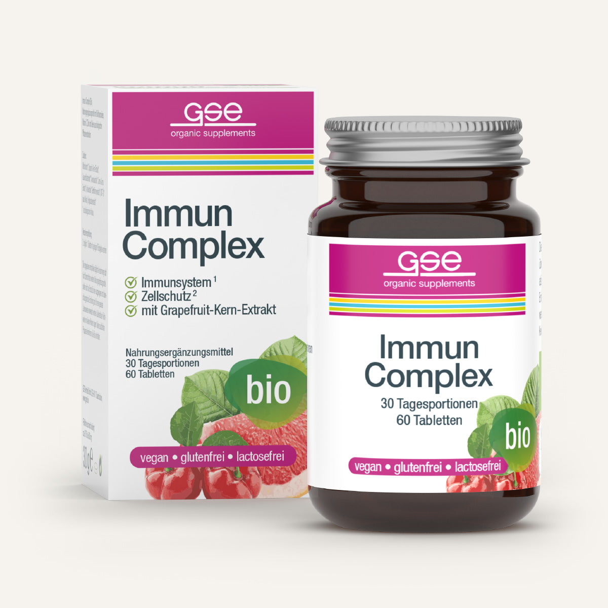 Eine Flasche und eine Schachtel von gse.organic.supplements Immun Complex (Bio), mit gestreiften Etiketten und Himbeerbildern, unterstreichen seine pflanzliche Formel zur Unterstützung des Immunsystems - bio, vegan, glutenfrei und laktosefrei.