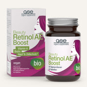 Eine Schachtel und eine Flasche gse.organic.supplements Beauty Retinol-AE Boost (Bio) mit 60 veganen Tabletten, Vitamin A und Biotin; die Verpackung zeigt ein stilisiertes Frauengesicht, grüne und violette Schrift und Bio/Vegan-Etiketten.