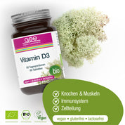 Eine Flasche gse.organic.supplements Vitamin D3 Compact (Bio) Tabletten steht neben einer weißen Flechte. Das bio-zertifizierte Etikett weist darauf hin, dass es gluten- und laktosefrei ist, und die grünen Symbole zeigen die Vorteile für Knochen, Muskeln und das Immunsystem an.