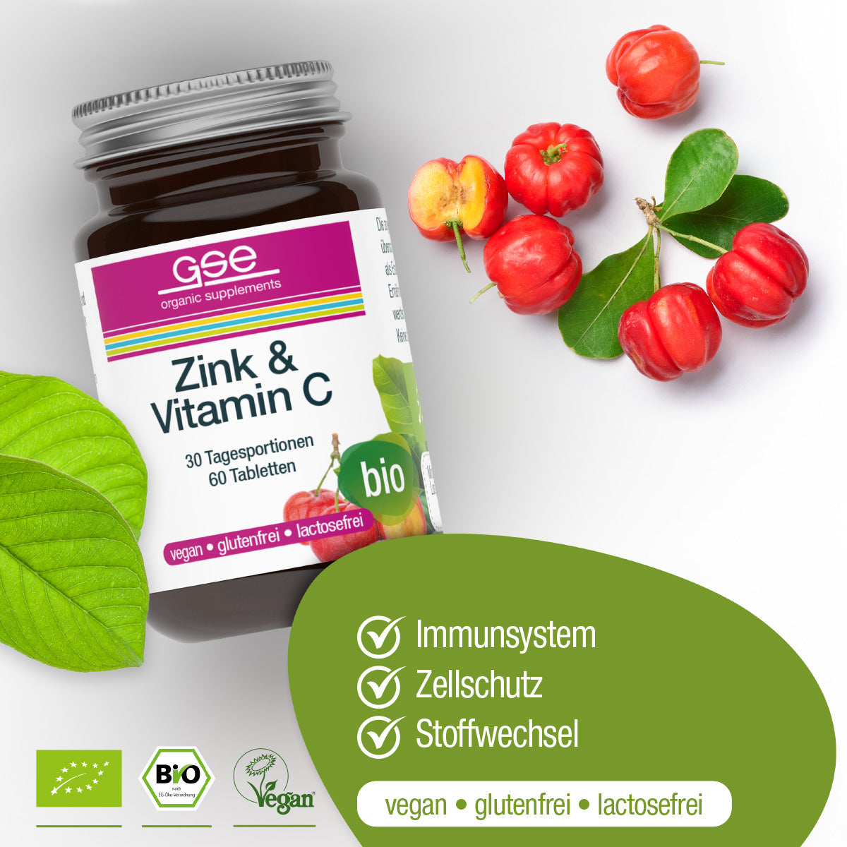 Eine Flasche gse.organic.supplements Zink & Vitamin C (Bio) Tabletten steht neben Acerola-Kirschen und grünen Blättern. Die Etiketten zeigen vegan, glutenfrei, laktosefrei. Der Text hebt die Unterstützung des Immunsystems, des Zellschutzes und des Stoffwechsels hervor.